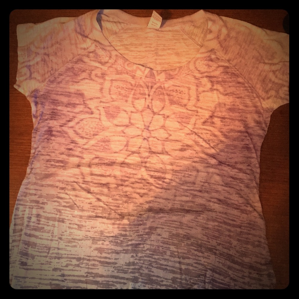 A purple flower design T-shirt.